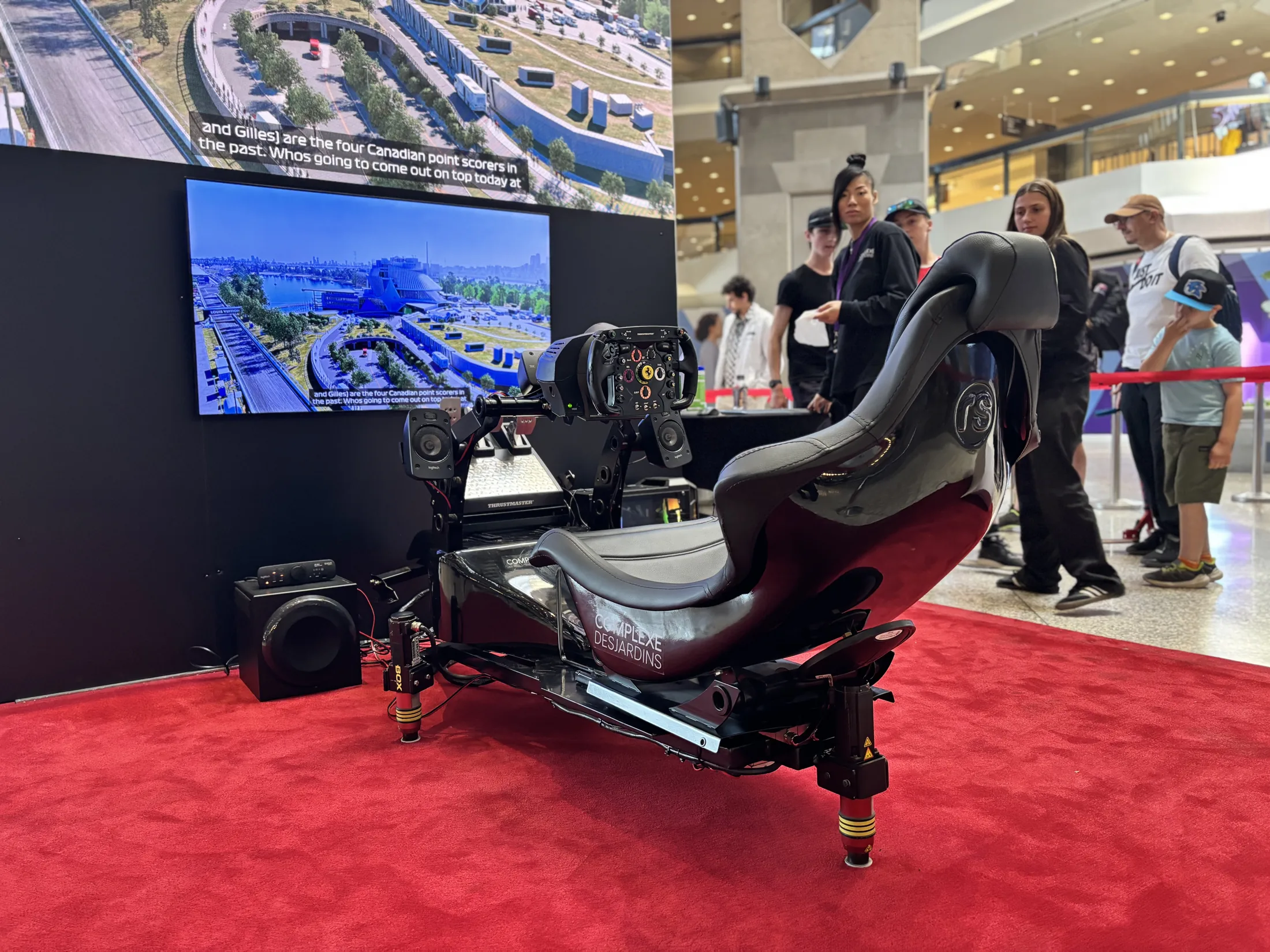Formula-style event simulator with an upright driving position