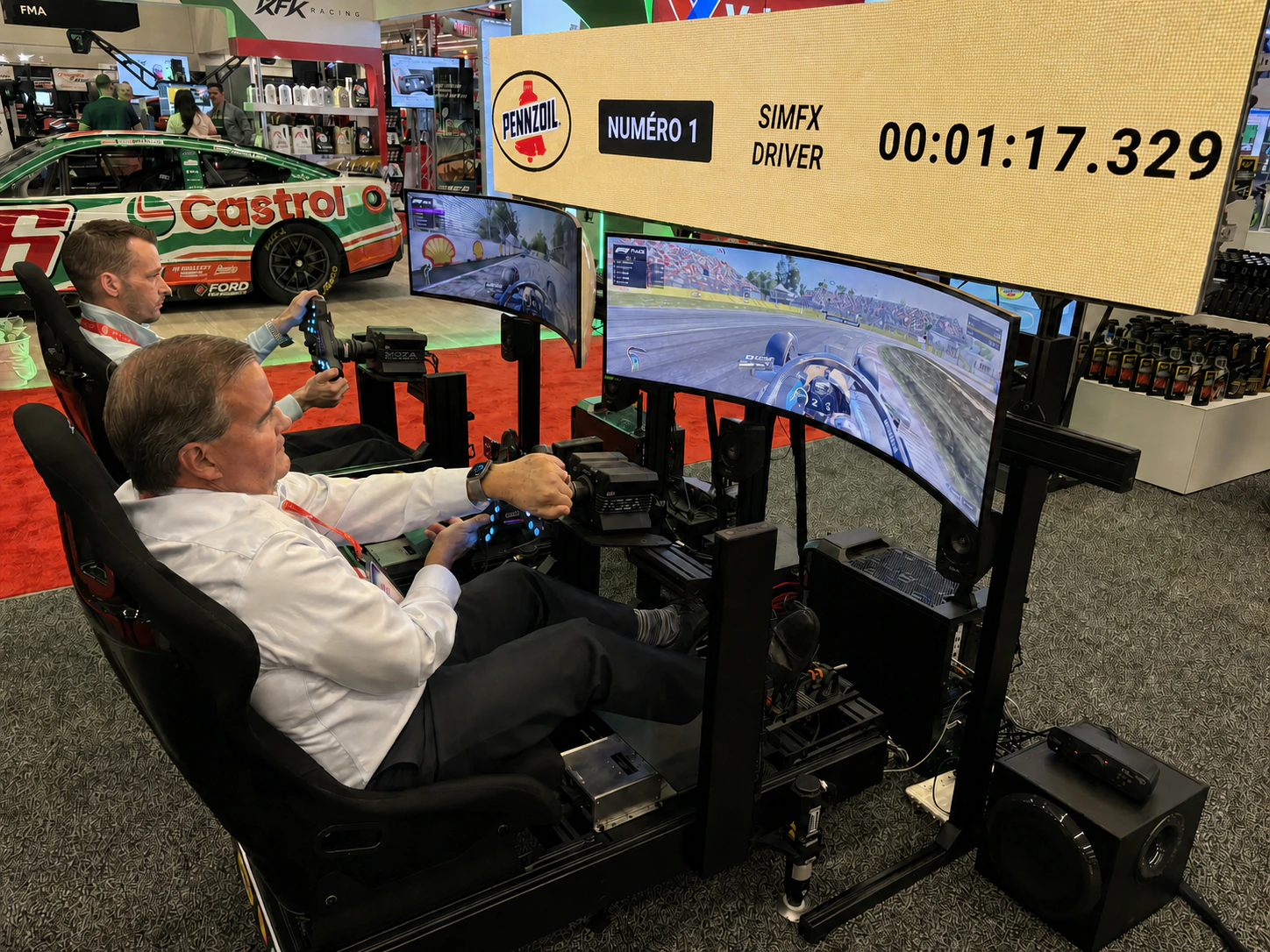 Live racing leaderboard displayed above event simulators