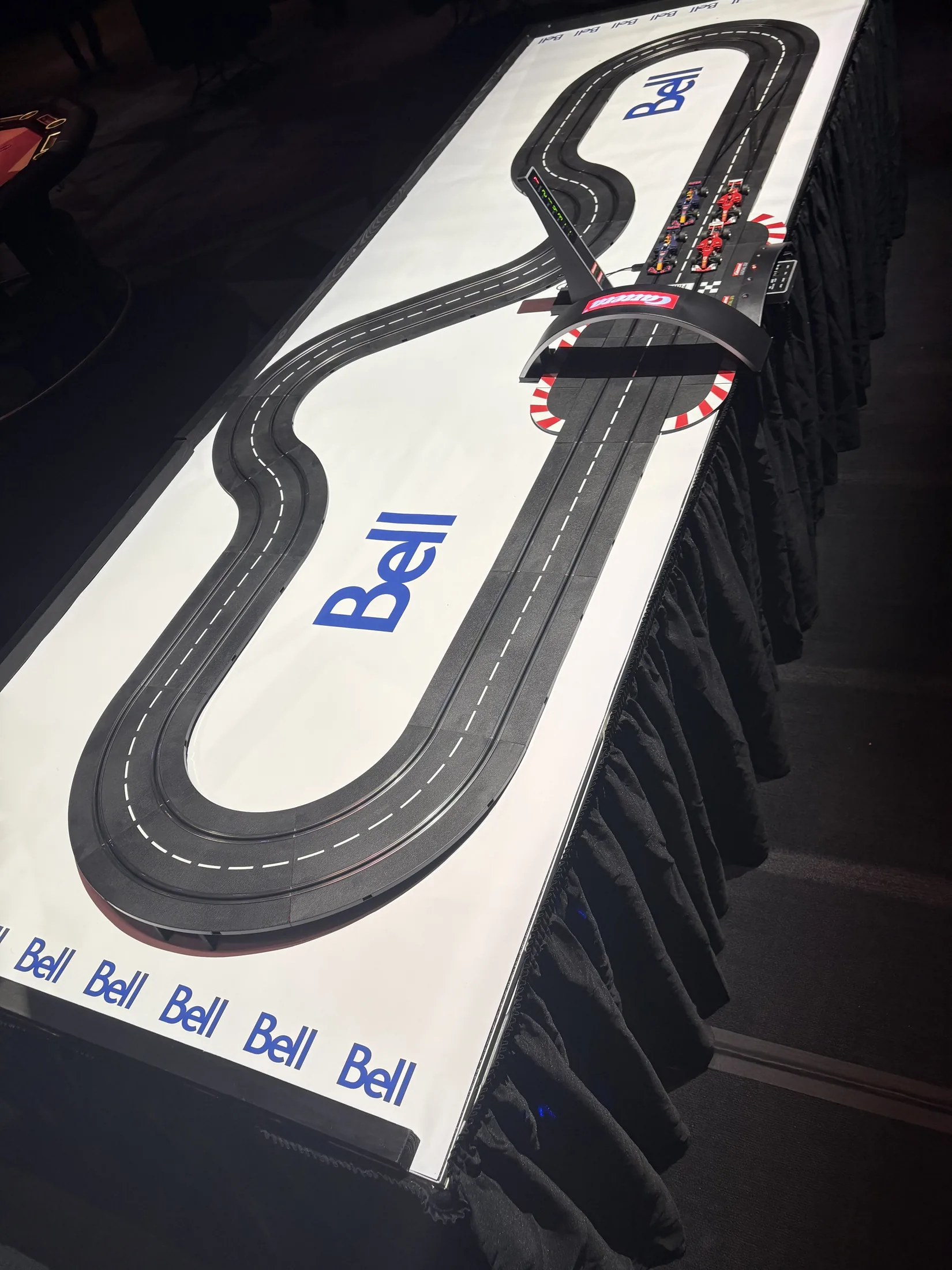 Bell’s custom four-car miniature Formula racing track at a private Grand Prix event