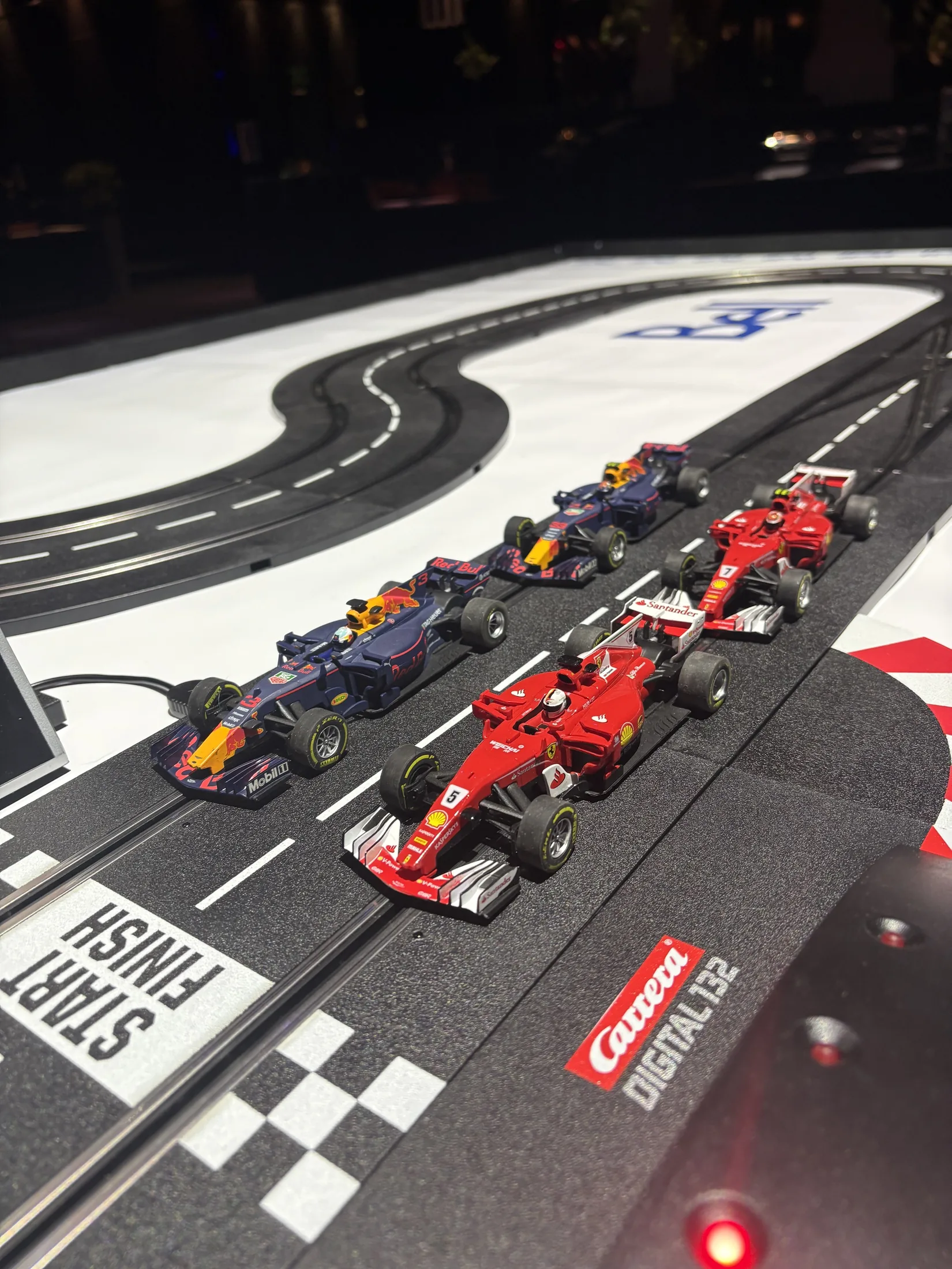 Guests competing on the Bell miniature Formula race track